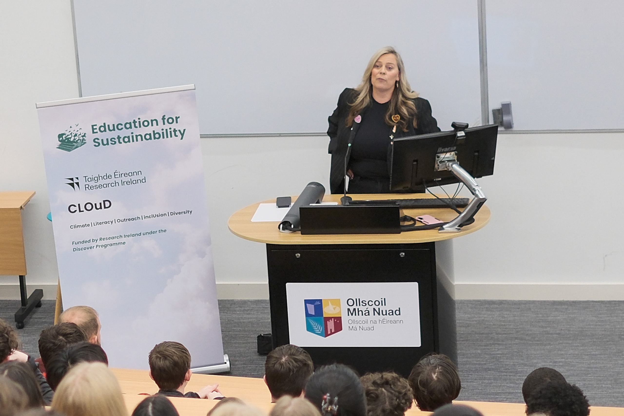 Dr Katriona O'Sullivan speaking at Maynooth Universtiy|A picture of Katriona O'Sullivan giving a talk at Maynooth University
