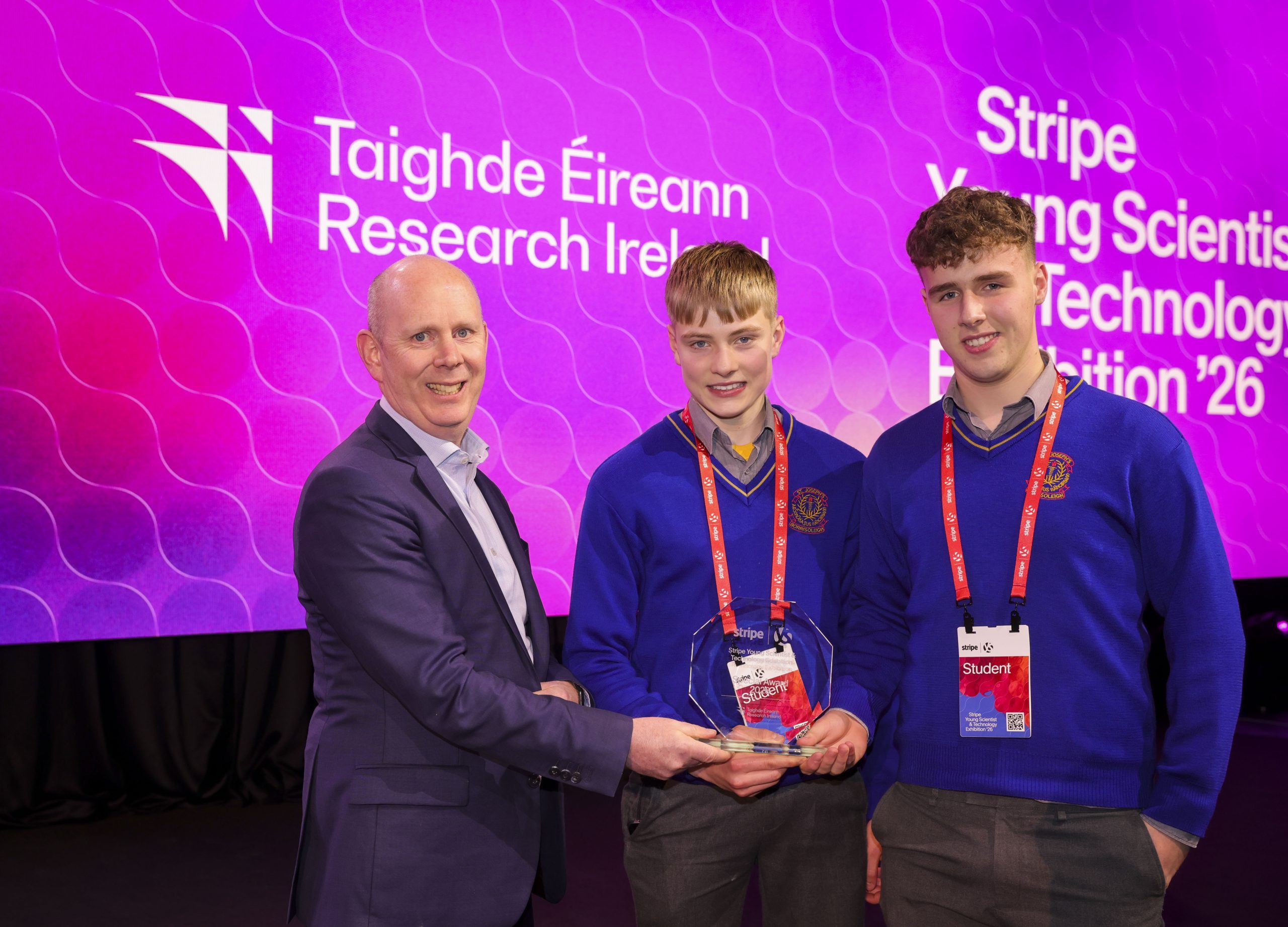 Daniel Ryan Begley and James Maher pictured receiving their award from Research Ireland CEO Dr Diarmuid O’Brien.
