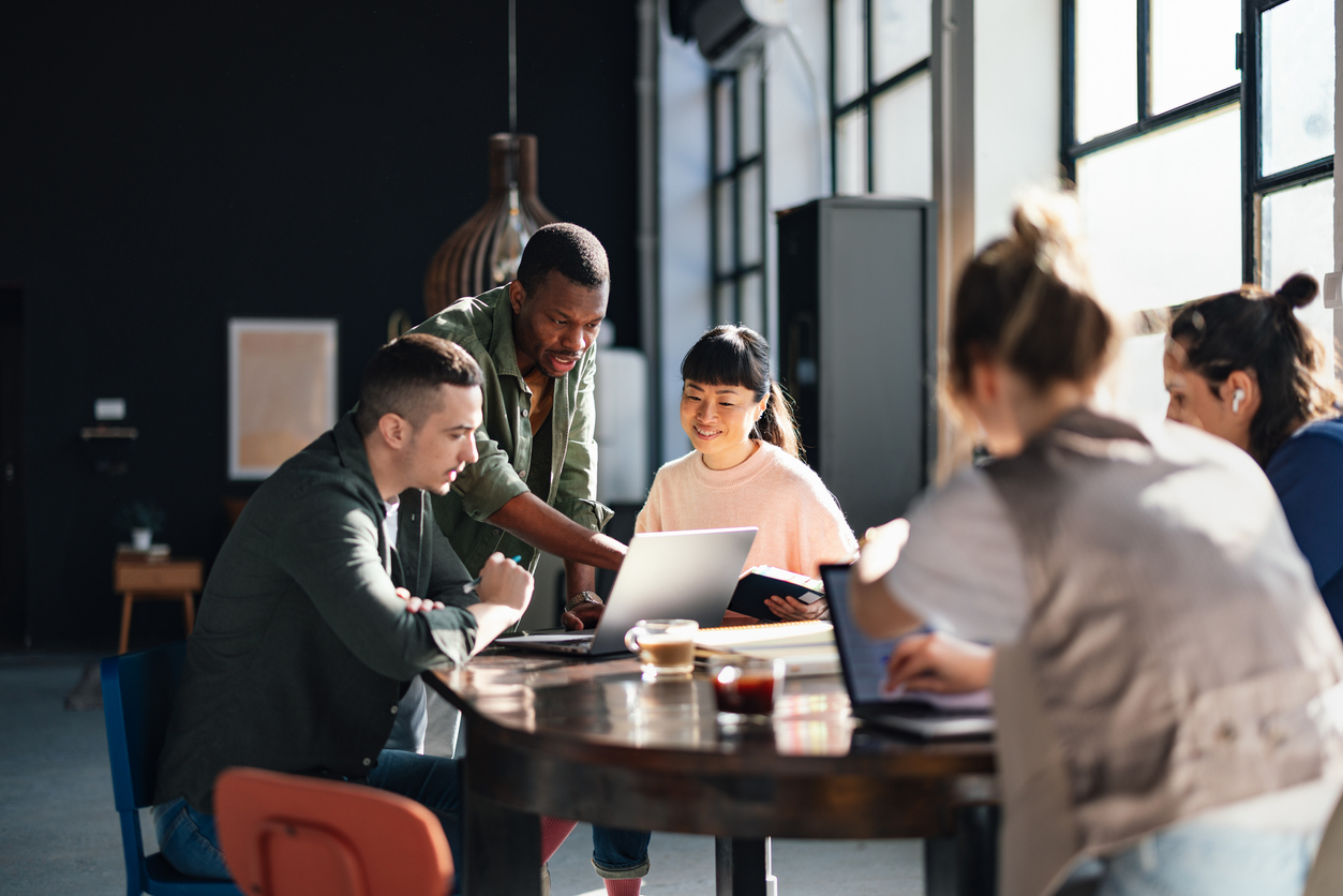 A group of people collaborating at a table