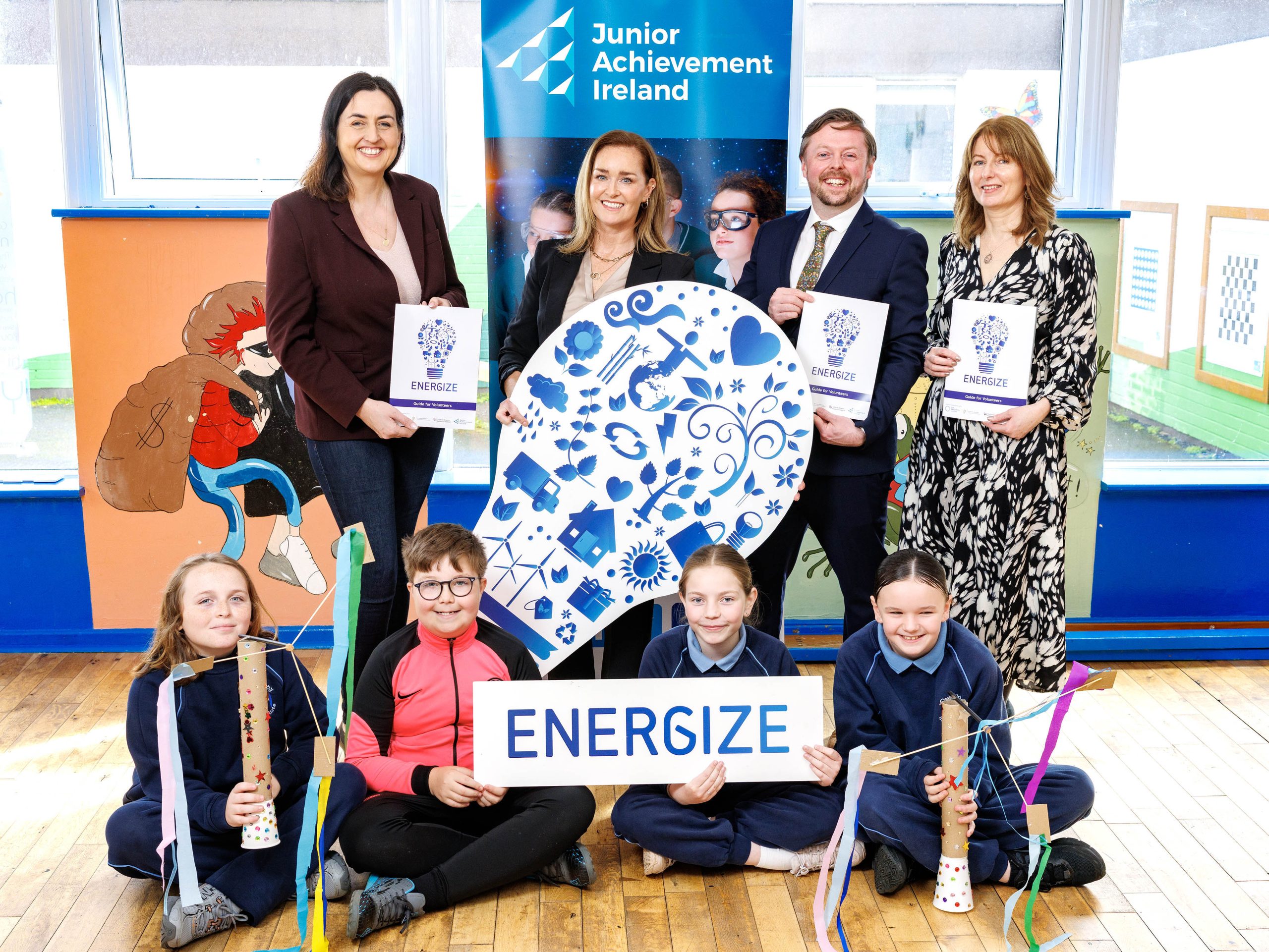 Anne Moore, Gas Networks Ireland, Ann Butler, Junior Achievement Ireland, Brendan Owens, Research Ireland and Kathleen Murtagh, Department of Education and Youth pictured with Charlie, Frankie, Ellie and Lily Students from Our Lady Immaculate SNS in Darndale, Dublin who helped launch Junior Achievement Ireland's Energize programme, which aims to broaden students’ understanding of science, environmental responsibility, and the diverse paths open to them in the future world of work. Thanks to funding from the Research Ireland Discover Programme, supported by the Department of Education and Youth and Gas Networks Ireland, JAI is running the Energize programme in primary schools around Ireland. Pic: Marc O'Sullivan
