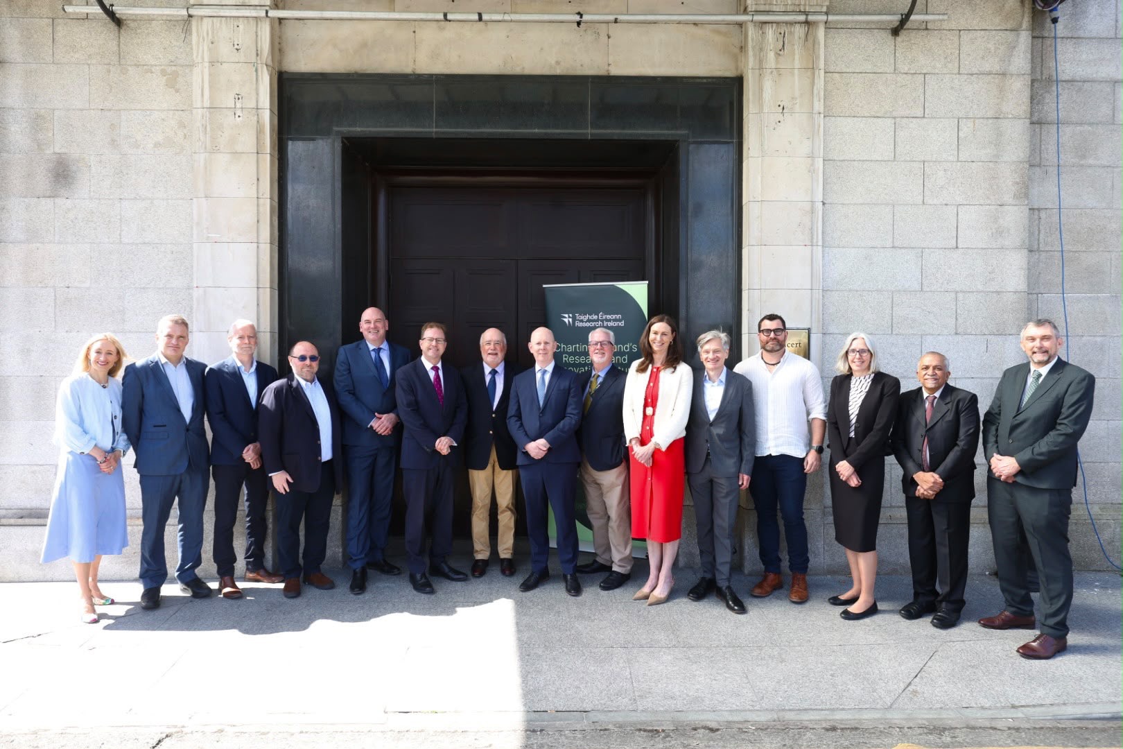 Image shows Minister James Lawless with partners of the new Rinn centres.