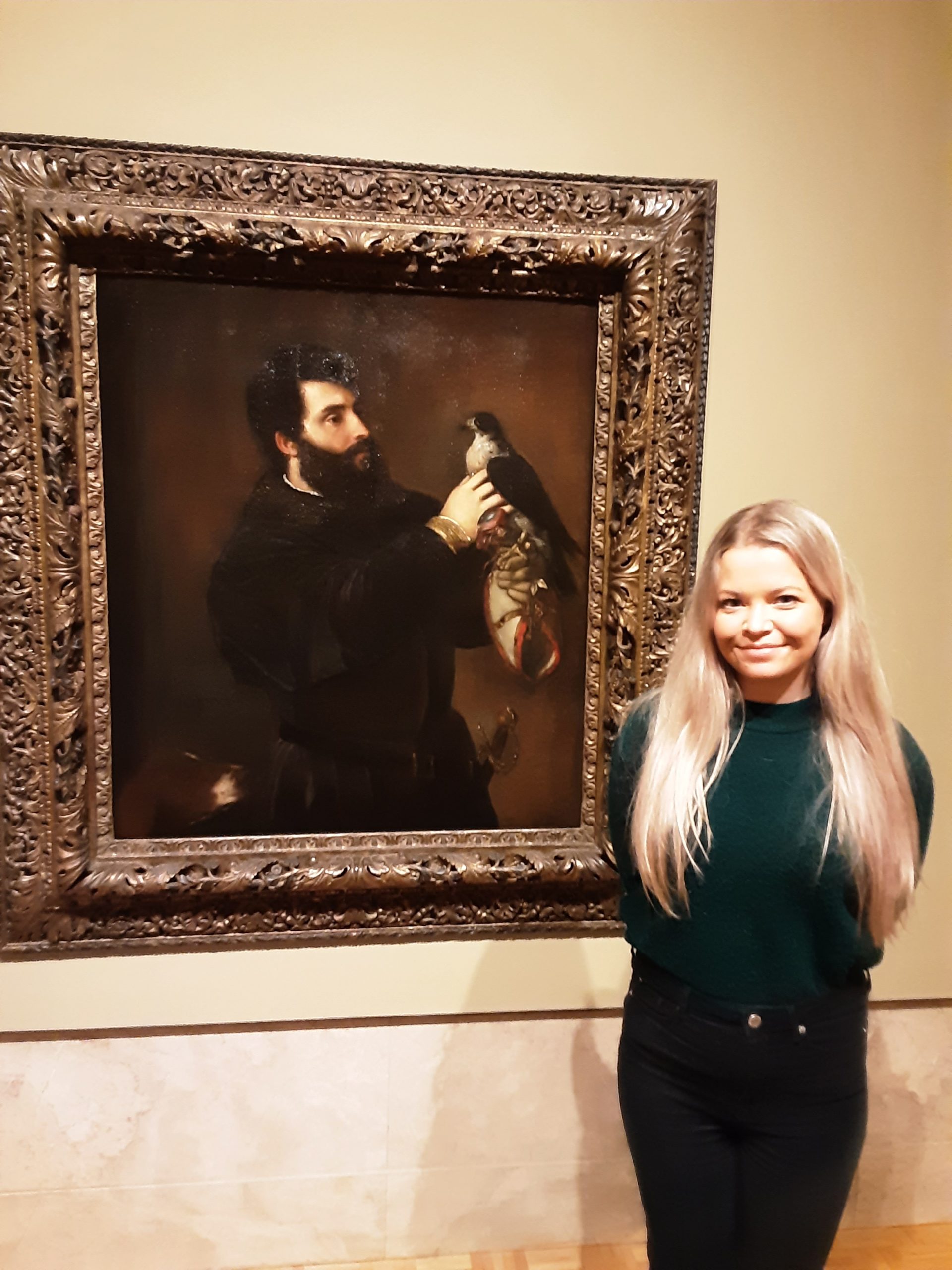 Dr Healy with Titian’s Portrait of a Man of the Cornaro Family with a Falcon, late 1520s, oil on canvas, 108.6 × 96.5 cm, Joslyn Art Museum, Omaha, Nebraska.